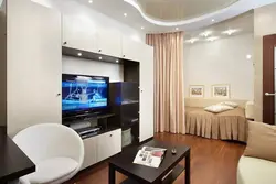 Studio apartment with a niche interior design photo