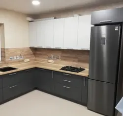 Light gray kitchen with dark countertop photo