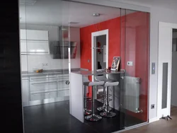 Kitchen behind a glass partition photo