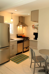 Apartment kitchen design with refrigerator