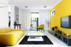 Сочетание желтого и серого в интерьере гостиной