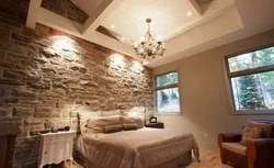Інтэр'ер спальні з дэкаратыўным каменем