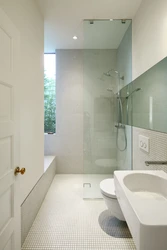 Narrow bathroom design with window