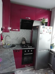 Kitchen design 6 m2 with refrigerator and geyser photo