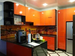 Orange kitchen set in the kitchen interior