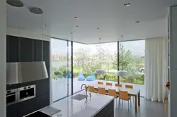 Kitchen living room with panoramic windows design photo