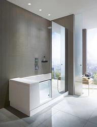 Bathroom design with glass bath partition