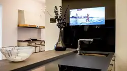Photo of TV in the kitchen on the table