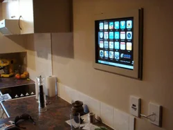 Photo of TV in the kitchen on the table