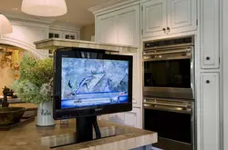 Photo of TV in the kitchen on the table