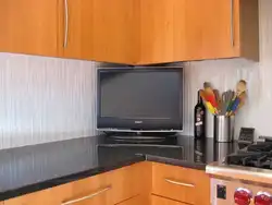 Photo of TV in the kitchen on the table