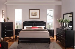 Bedroom interior with dark colored furniture