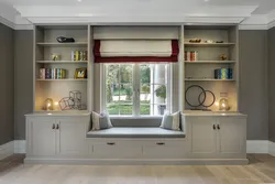 Cabinets By The Window In The Living Room Interior