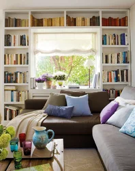 Cabinets By The Window In The Living Room Interior