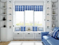 Cabinets by the window in the living room interior