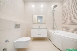 Bathroom Design With Toilet Tiles In Light Colors
