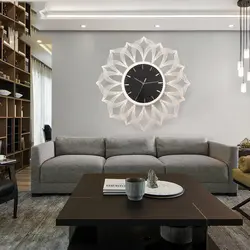 Large wall clock in the living room in the interior photo