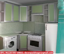 Kitchen design in Khrushchev with a gas water heater and a washing refrigerator