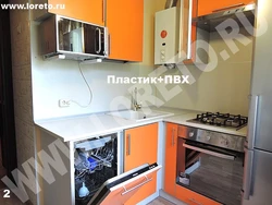 Kitchen design in Khrushchev with a gas water heater and a washing refrigerator