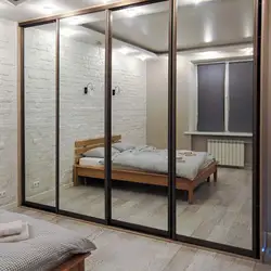 Photo Of A Wardrobe In The Bedroom With A Mirror For Three Doors