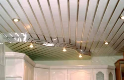 Ceiling made of PVC panels in the kitchen photo