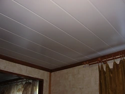 Ceiling made of PVC panels in the kitchen photo