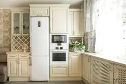Beige household appliances in the kitchen interior