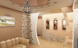 Дизайн гостиной с каменной стеной
