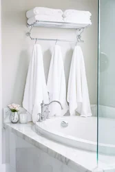 How to hang towels in the bathtub photo