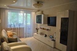 Interior of a living room in Khrushchev 18 sq m with a balcony