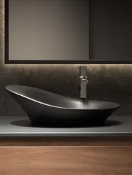 Black sink in the bathroom interior