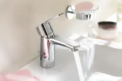 Bathroom sink taps photo