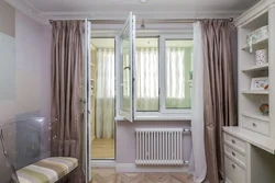 Bedroom design with a door to the balcony
