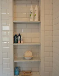 Niche In The Bathroom For Shampoos Made Of Tiles Photo