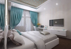 Turquoise curtains in the bedroom interior photo