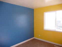 Modern painting of walls in an apartment instead of wallpaper photo