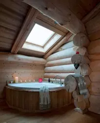 Bathtub in a log house photo