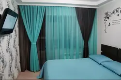 Mint curtains in the bedroom interior