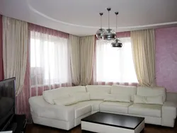 Corner living room with two windows photo
