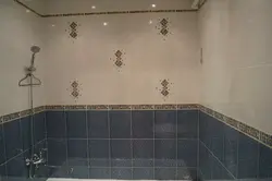 Laying out tiles in the bathroom photo