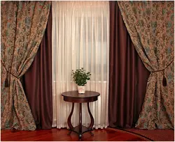 Curtains with a pattern in the living room interior