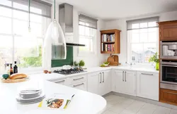 Kitchens on two walls with a window photo