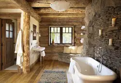 Интерьер ванны с деревом и камнем