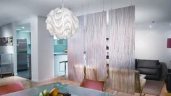 Curtains as a partition in an apartment photo