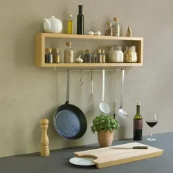 Shelves on the wall in the kitchen interior above the table