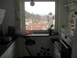 Kitchen by the window in a Khrushchev apartment photo
