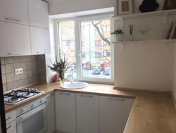 Kitchen by the window in a Khrushchev apartment photo
