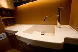 Жасанды тастан жасалған ваннаға арналған раковиналар фото