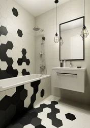 White bathroom design with one black wall