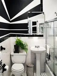 White Bathroom Design With One Black Wall